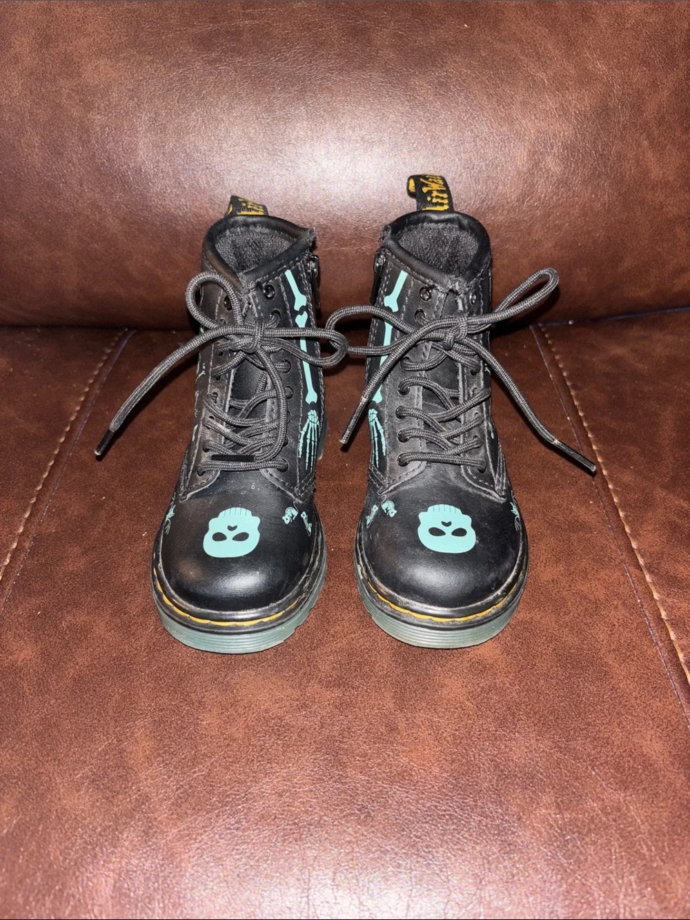 Dr. Martens Kids Black Boots with Teal Skull Accents